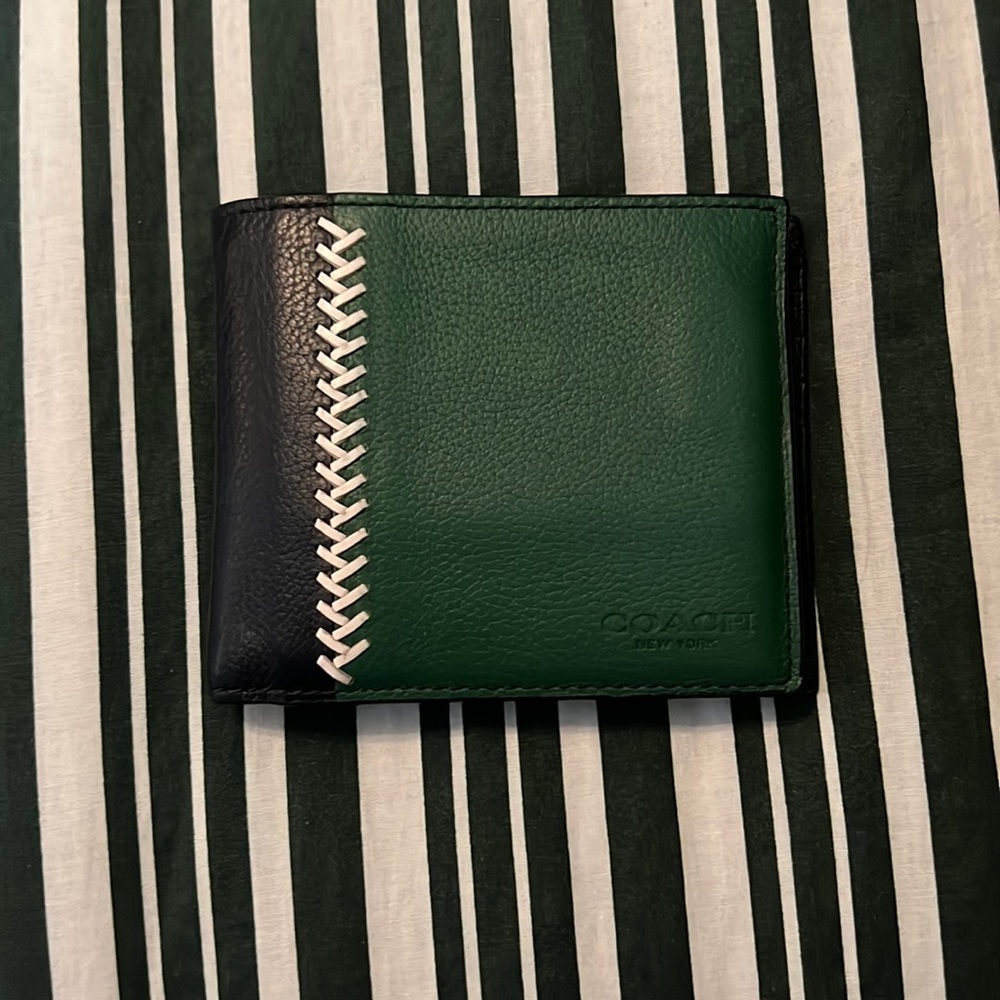 Gently used Coach authentic brand mens wallet.